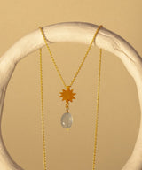 Vela gold pendant necklace